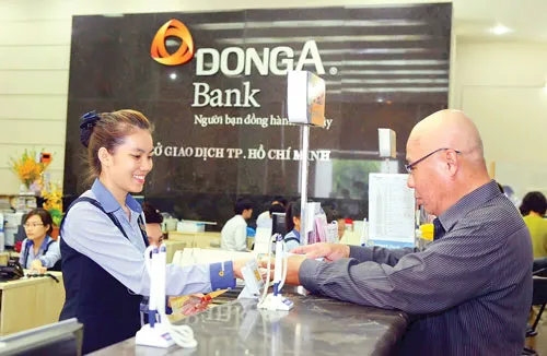 Thanh khoản không còn là nỗi ám ảnh của hệ thống ngân hàng thương mại, gây áp lực lên kinh tế vĩ mô. Ảnh: LONG THANH