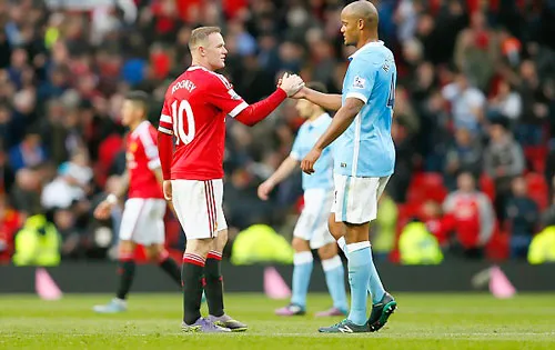 Rooney và Kompany đều có những vấn đề trước trận. Ảnh: Reuters
