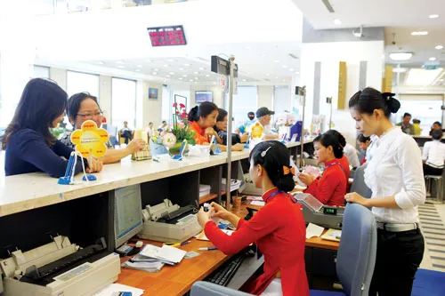 Hiện nay nhiều NH đã cạn “room” tín dụng. Ảnh: LÃ ANH