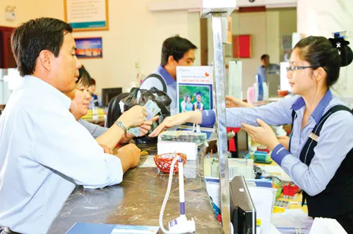 Không chỉ NH mà nhiều cơ quan liên quan gây khó cho việc giải ngân. Ảnh: LONG THANH