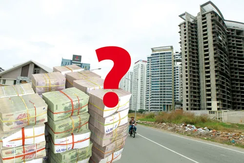 NHTM sẽ cân nhắc có nên tiếp tục đổ vốn vào thị trường BĐS. Ảnh: LÃ ANH