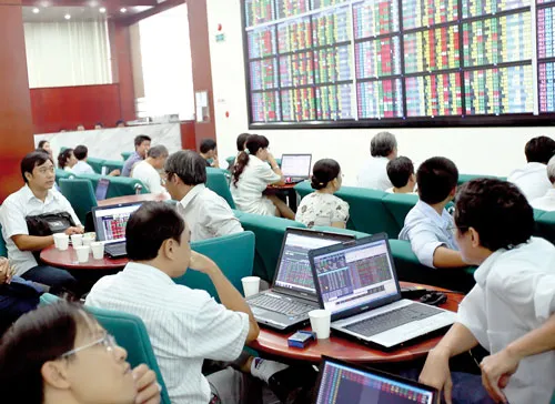 Thực trạng lỗ nặng của các doanh nghiệp niêm yết đang khiến NĐT lo âu. Ảnh: LÃ ANH