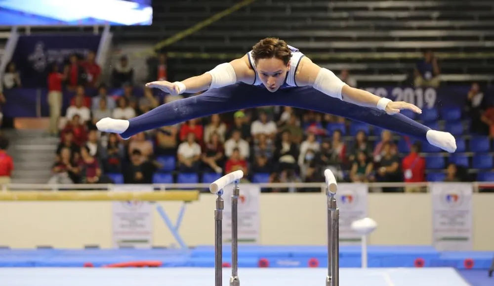 Đinh Phương Thành chiến thắng ở nội dung xà kép. Ảnh: DŨNG PHƯƠNG