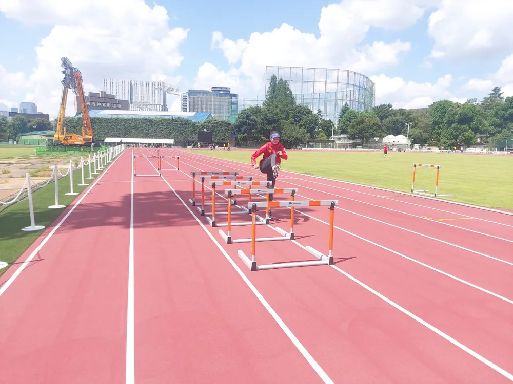 Quách Thị Lan được vào sân tập điền kinh Olympic ảnh 2