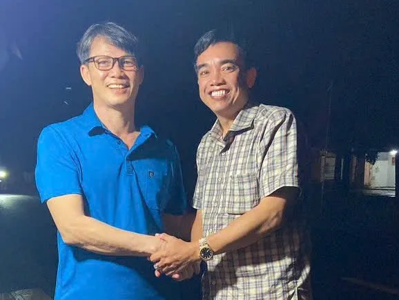 Ông Trần Văn Tâm (trái) khi được tại ngoại. Ảnh: CTV