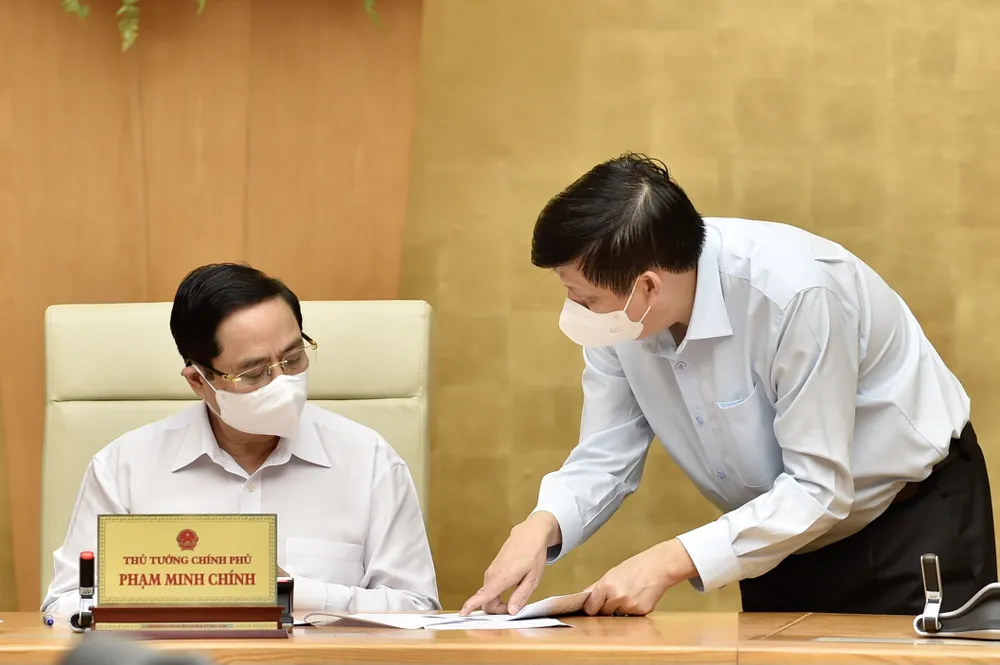 Thủ tướng: chống dịch quyết liệt, tỉnh kiểm tra huyện, huyện kiểm tra xã, xã kiểm tra tổ dân phố ảnh 1