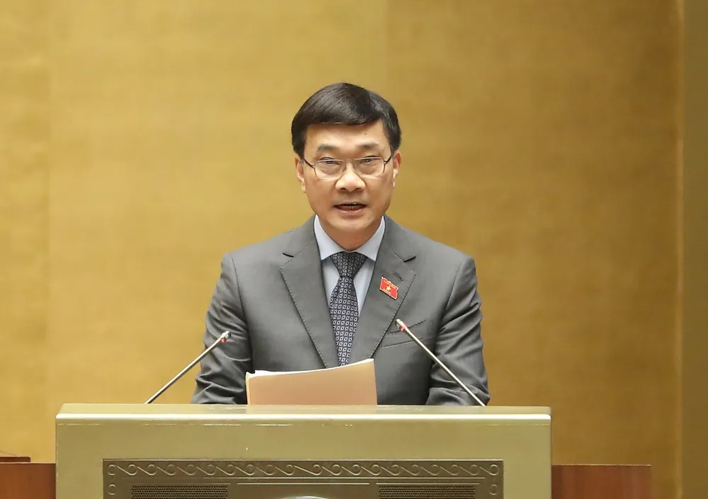 Chủ nhiệm Ủy ban Kinh tế của Quốc hội Vũ Hồng Thanh trình bày báo cáo. Ảnh: QUANG PHÚC