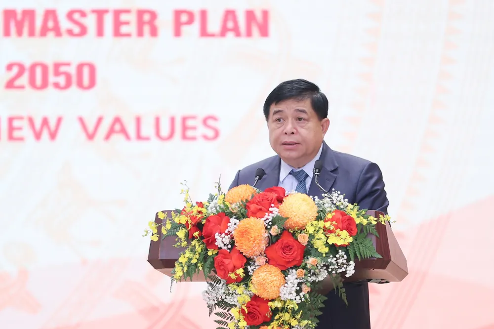 Bộ trưởng Bộ KH-ĐT Nguyễn Chí Dũng công bố Quy hoạch tổng thể quốc gia thời kỳ 2021-2030, tầm nhìn đến năm 2050. Ảnh: QUANG PHÚC