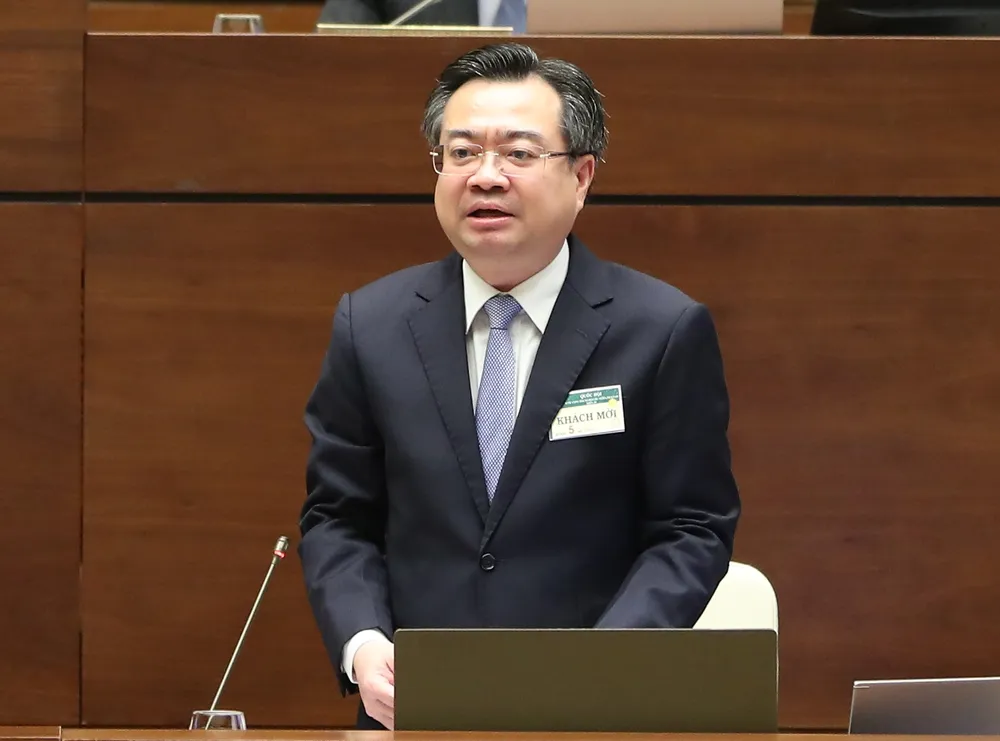 Bộ trưởng Bộ Xây dựng Nguyễn Thanh Nghị giải trình. Ảnh: QUANG PHÚC