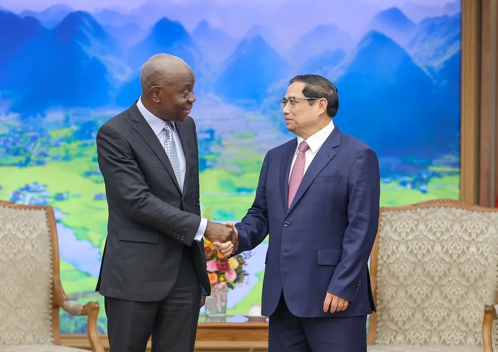 Thủ tướng Phạm Minh Chính tiếp ông Gilbert F. Houngbo, Tổng Giám đốc Tổ chức Lao động Quốc tế (ILO). Ảnh VIẾT CHUNG