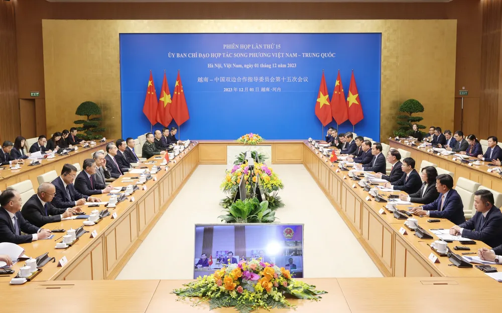 Phó Thủ tướng Trần Lưu Quang và Bộ trưởng Ngoại giao Trung Quốc Vương Nghị đồng chủ trì Phiên họp lần thứ 15 - Ủy ban Chỉ đạo hợp tác song phương Việt Nam – Trung Quốc. Ảnh: QUANG PHÚC