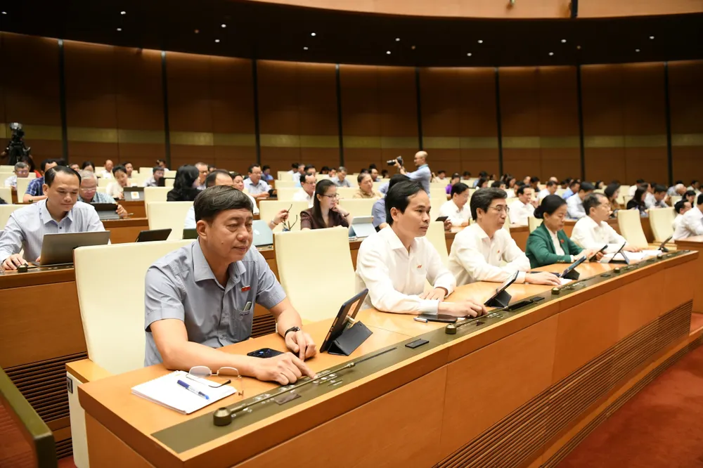 Quốc hội biểu quyết thông qua nghị quyết của Quốc hội về tổ chức chính quyền đô thị và thí điểm một số cơ chế, chính sách đặc thù phát triển thành phố Đà Nẵng..jpg