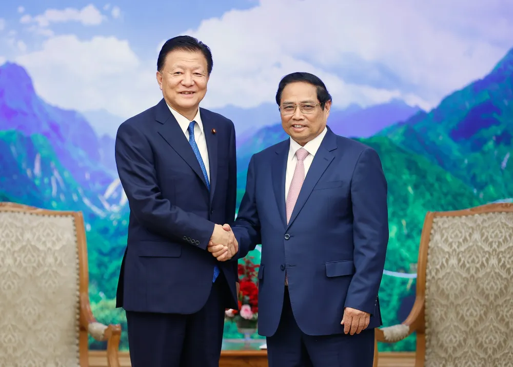 Thủ tướng Phạm Minh Chính tiếp Bộ trưởng phụ trách Hiệp định đối tác toàn diện và tiến bộ xuyên Thái Bình Dương của Nhật Bản Shindo Yoshitaka, chiều 9-7. Ảnh VIẾT CHUNG.jpg
