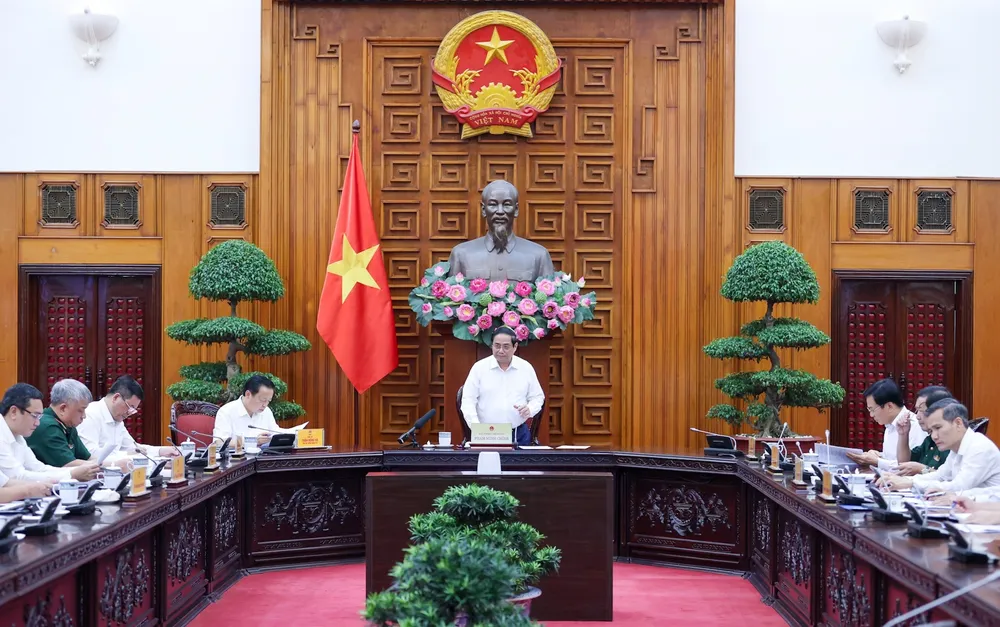 Thủ tướng Phạm Minh Chính chủ trì và phát biểu tại buổi làm việc với các bộ, ngành, địa phương để đẩy nhanh tiến độ hoàn thành Dự án đường dây tải điện 500 kV mạch 3 Quảng Trạch – Phố Nối, chiều 13-8. Ảnh VIẾT CHUNG.jpg