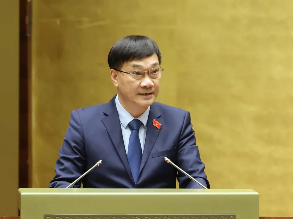 Chủ nhiệm Ủy ban Kinh tế của Quốc hội Vũ Hồng Thanh trình bày Báo cáo thẩm tra về chủ trương đầu tư bổ sung vốn nhà nước tại Ngân hàng Thương mại cổ phần Ngoại thương Việt Nam.jpg