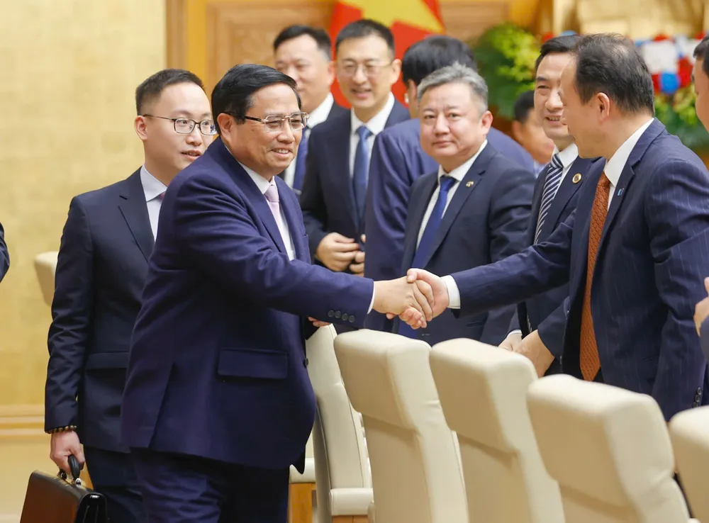 hủ tướng Phạm Minh Chính chủ trì và phát biểu tại cuộc toạ đàm với các doanh nghiệp Trung Quốc, chiều 28-2. Ảnh VIẾT CHUNG.jpg