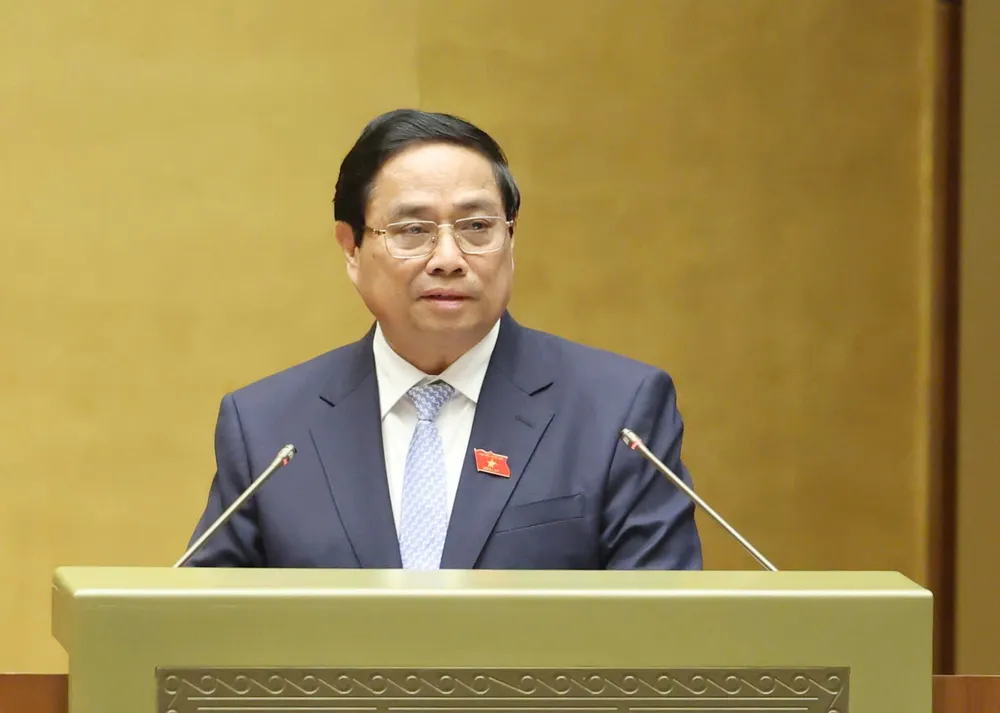 Thủ tướng Phạm Minh Chính trình bày báo cáo đánh giá bổ sung kết quả thực hiện kế hoạch phát triển kinh tế - xã hội và ngân sách nhà nước năm 2024.jpg