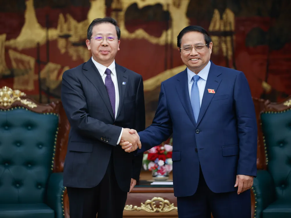 Thủ tướng Phạm Minh Chính tiếp ông Bành Cương Bình, Chủ tịch Hội đồng quản trị Tập đoàn Hoa Điện Trung Quốc.jpg