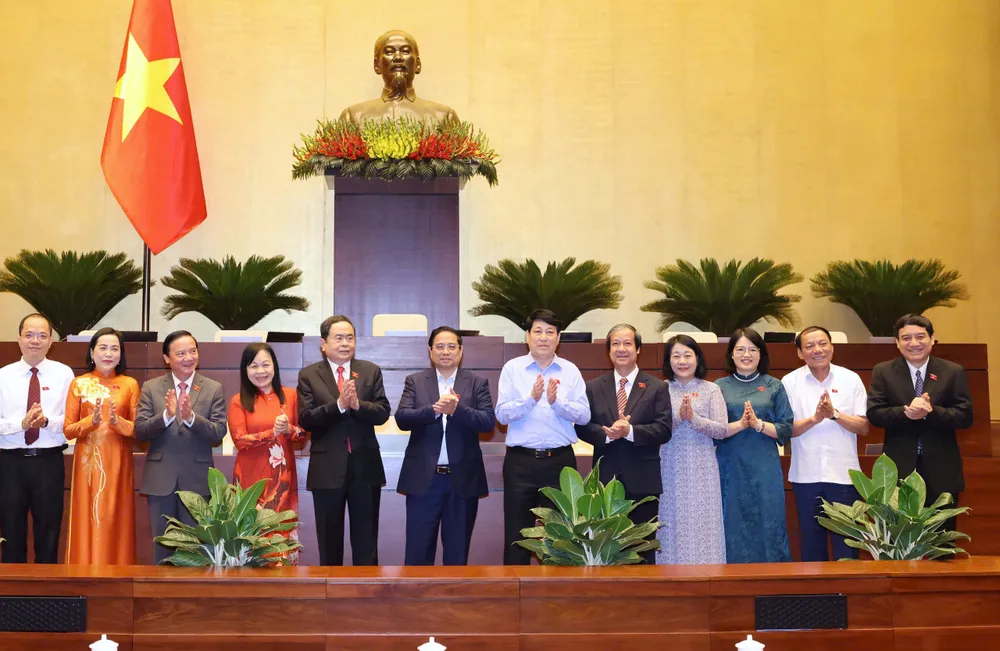 Chủ tịch nước Lương Cường, Thủ tướng Phạm Minh Chính, Chủ tịch Quốc hội Trần Thanh Mẫn và các đại biểu tại phiên họp sáng 16-6. Ảnh QUANG PHÚC.jpg