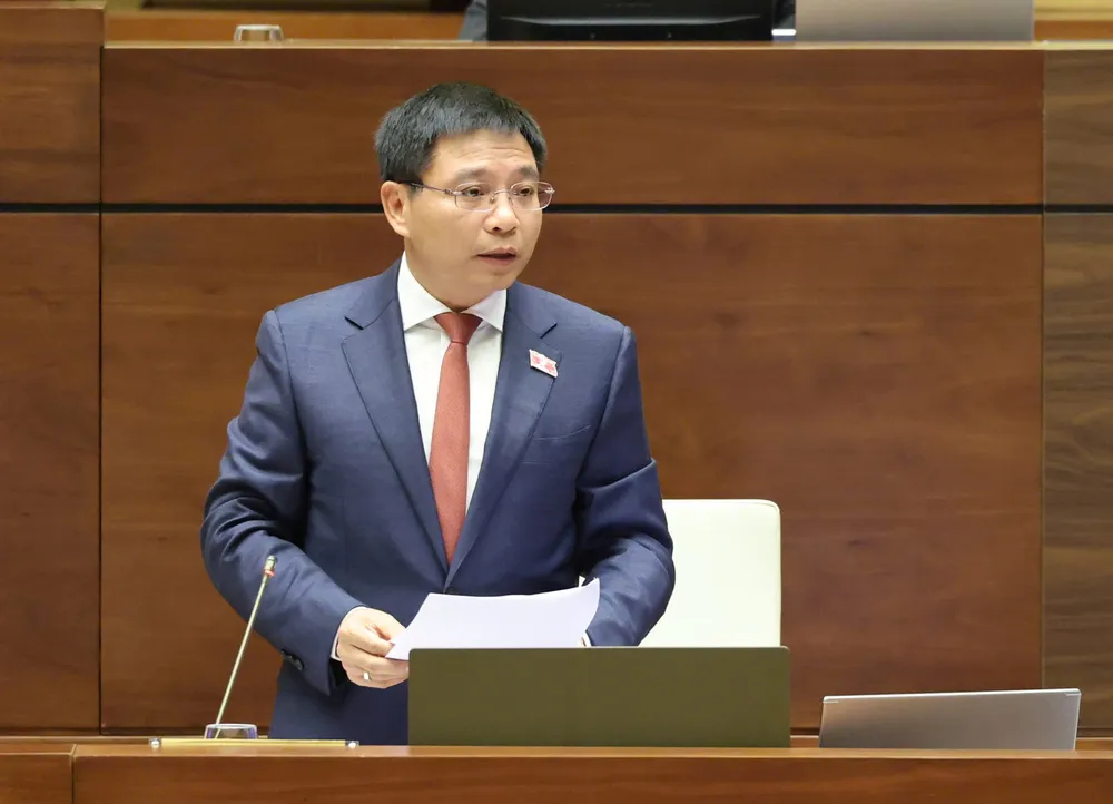 Bộ trưởng Bộ Tài chính Nguyễn Văn Thắng phát biểu giải trình, làm rõ một số vấn đề đại biểu Quốc hội nêu, sáng 26-11. Ảnh: QUANG PHÚC