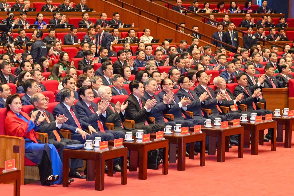 Các đồng chí lãnh đạo, nguyên lãnh đạo Đảng, Nhà nước và các đại biểu dự phiên khai mạc, sáng 20-1. Ảnh: VIẾT CHUNG