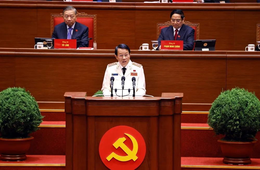 Đồng chí Lương Tam Quang, Ủy viên Bộ Chính trị, Bí thư Đảng ủy Công an Trung ương, Bộ trưởng Bộ Công an, tham luận về vấn đề “Công tác công an thực hiệnQ..jpg