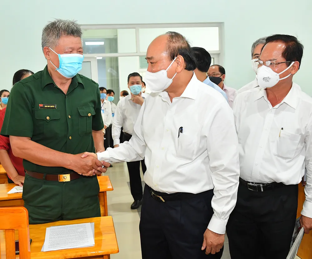 Chủ tịch nước Nguyễn Xuân Phúc: đưa huyện Hóc Môn, Củ Chi trở thành thành phố phía Tây, cực tăng trưởng mới của TPHCM ảnh 2