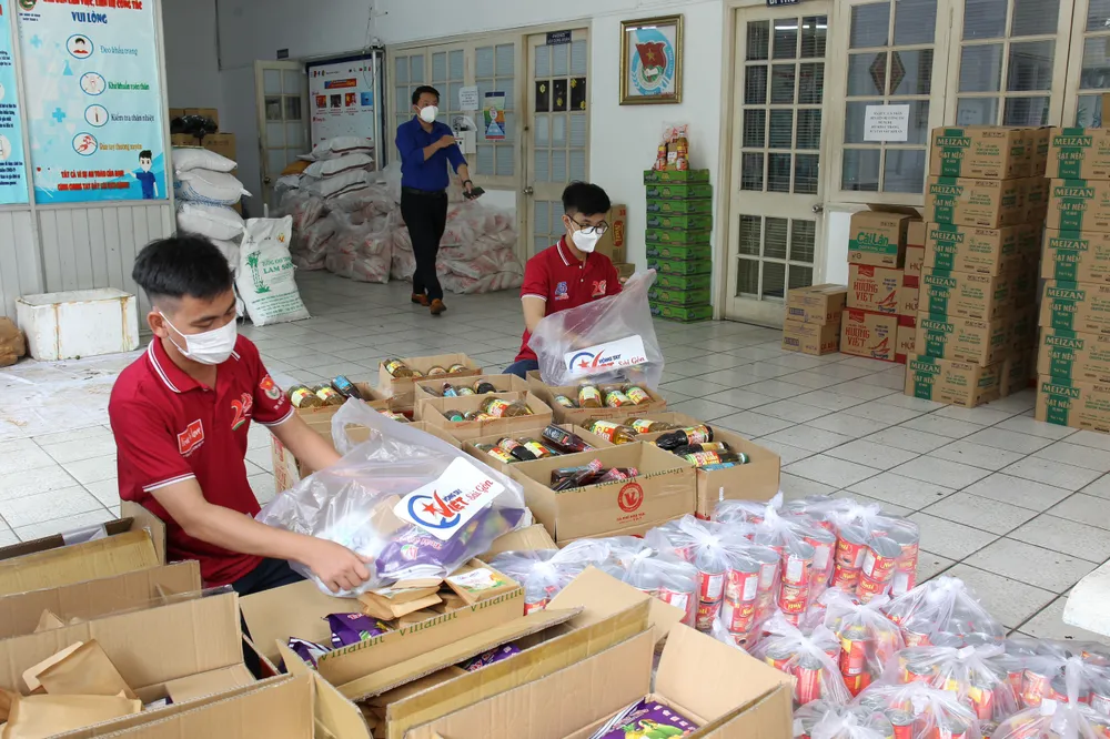 14.000 tấn gạo hỗ trợ của Chính phủ được TPHCM phát tới người dân trước ngày 5-9 ảnh 4