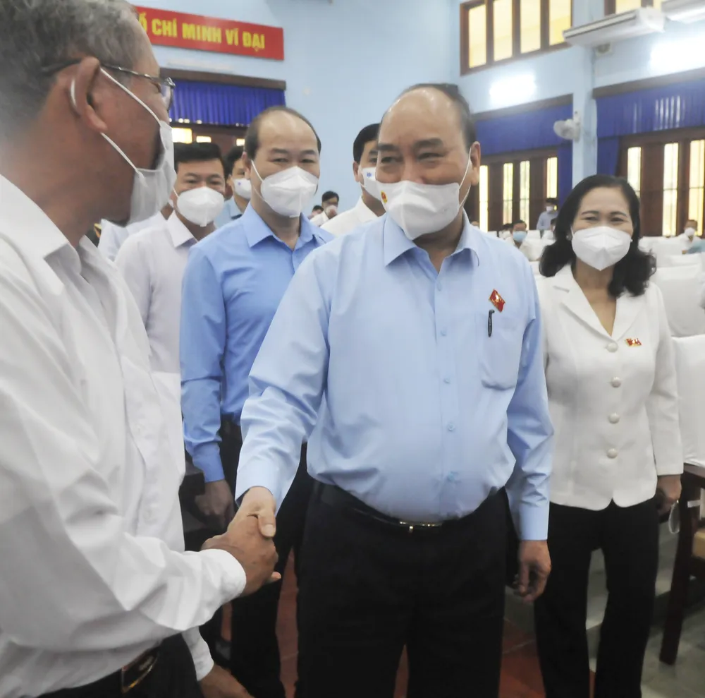 Chủ tịch nước Nguyễn Xuân Phúc: TPHCM cần lấy lại vị thế, hình ảnh trên mọi phương diện ảnh 2