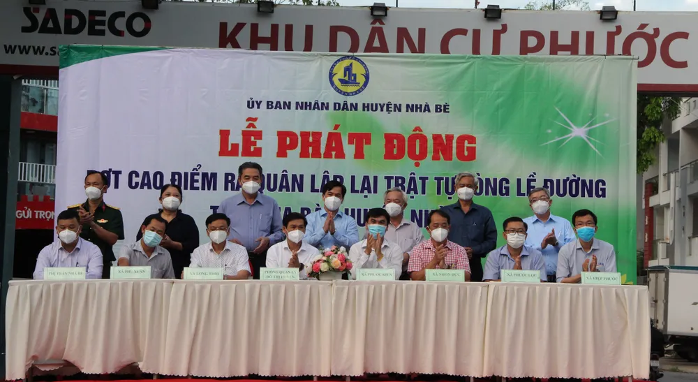 Nhà Bè ra thời hạn xóa 14 điểm đen lấn chiếm lòng, lề đường ảnh 1