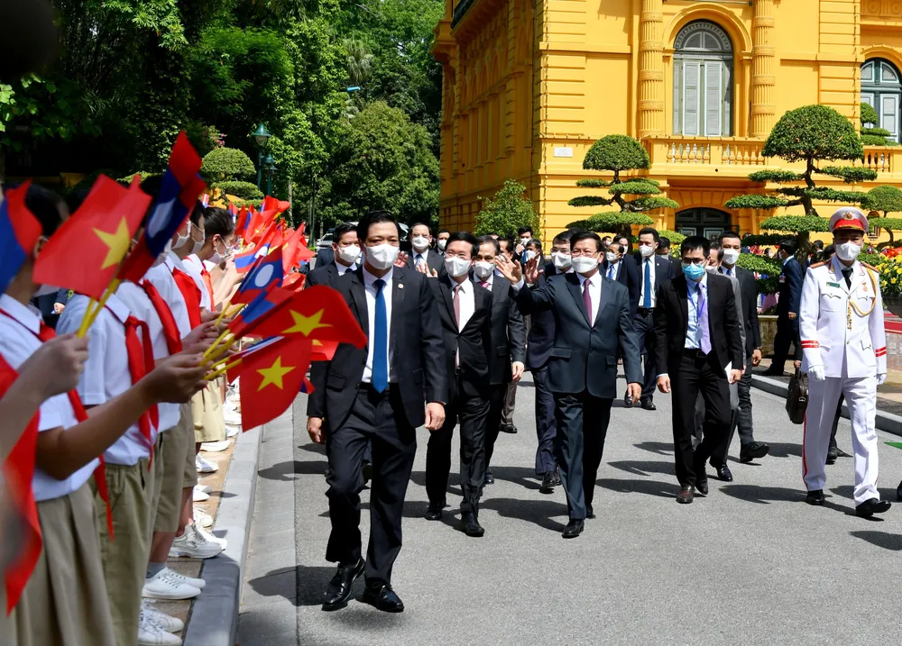 Tổng Bí thư, Chủ tịch nước Lào Thongloun Sisoulith thăm hữu nghị chính thức Việt Nam ảnh 4