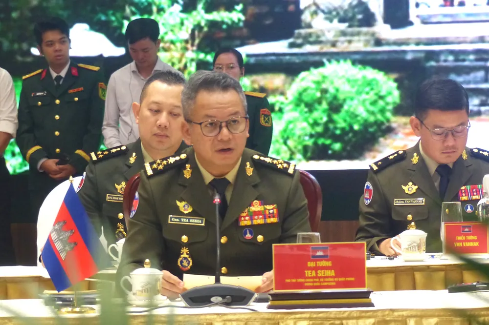 Anh cuoc gap 3 Bo truong QP 5.jpg