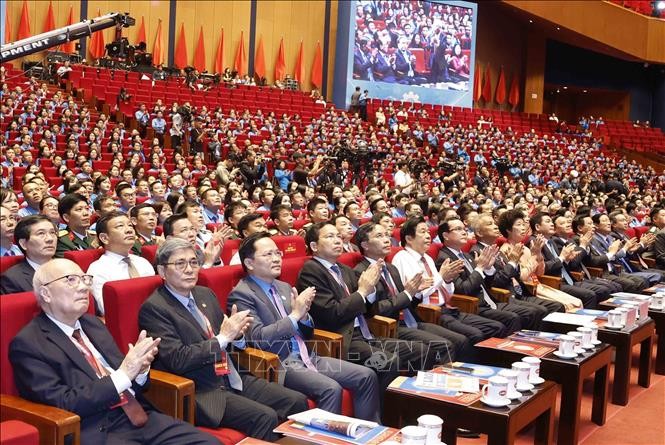 与会代表出席大会。图自越通社 。