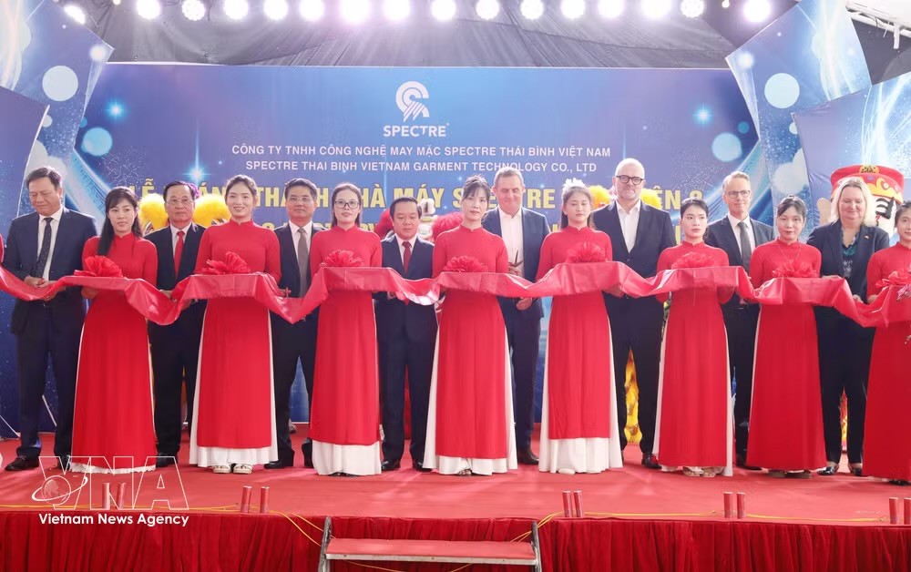 丹麦Spectre集团Spectre兴安2号制衣厂竣工仪式30日上午在兴安省茶江工业园举行。图自越通社