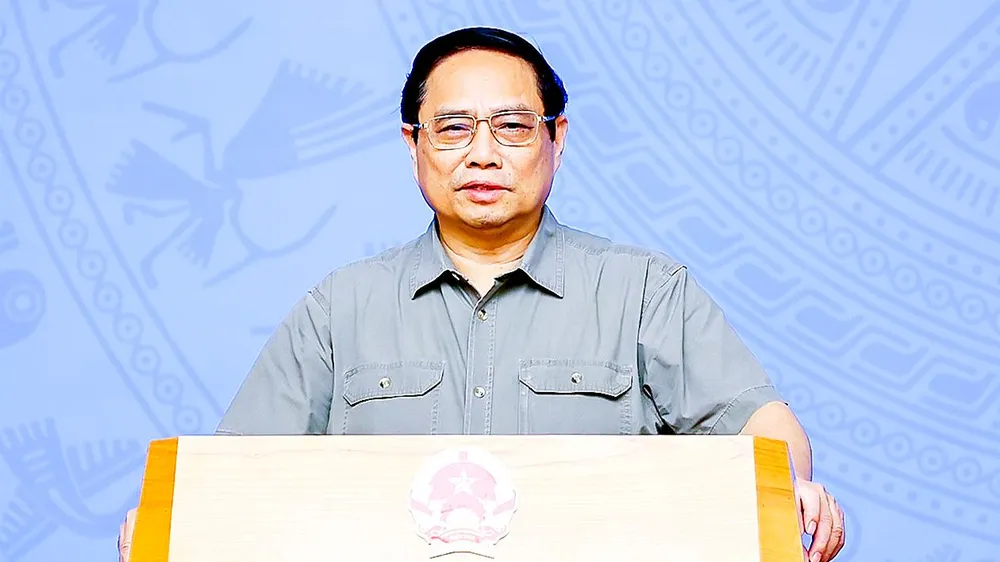 Thủ tướng Phạm Minh Chính phát biểu tại hội nghị tổng kết công tác phòng chống dịch Covid-19 của Ban Chỉ đạo quốc gia phòng chống dịch Covid-19 trực tuyến với các địa phương. Ảnh: VIẾT CHUNG