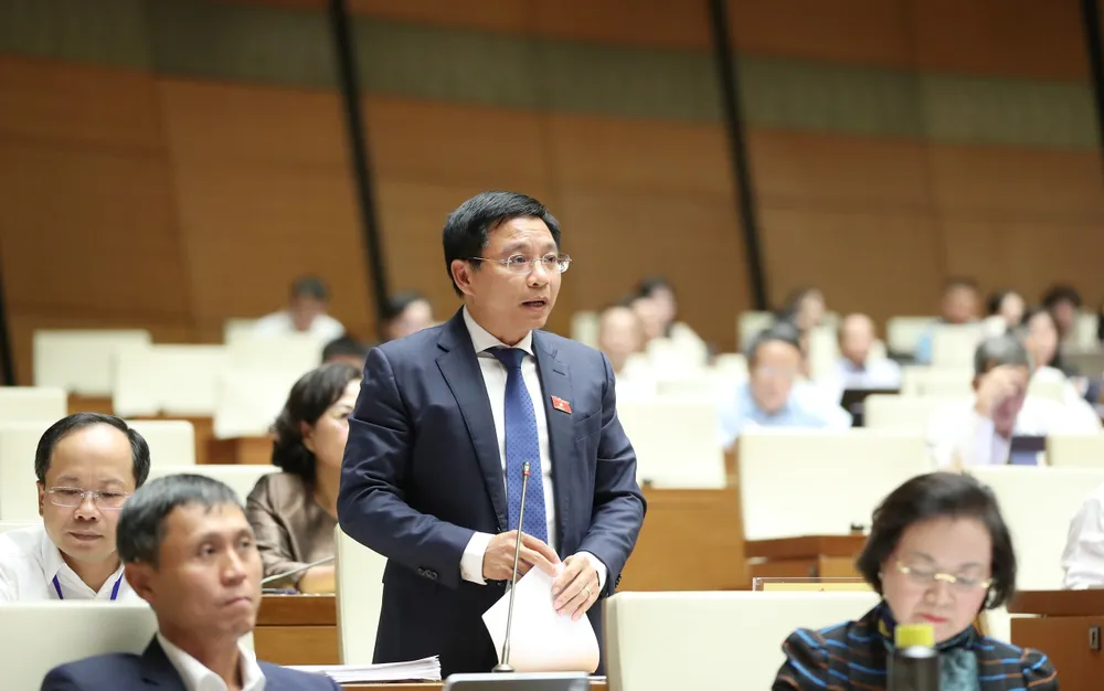 Bộ trưởng Bộ GTVT Nguyễn Văn Thắng phát biểu chiều 6-11. Ảnh: QUANG PHÚC