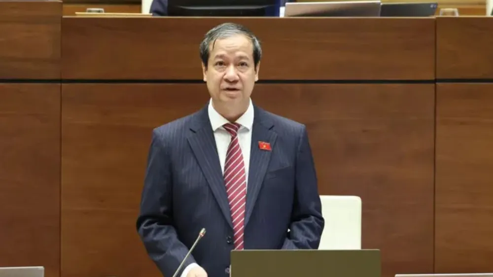 Bộ trưởng Bộ GD-ĐT Nguyễn Kim Sơn trả lời chất vấn của đại biểu Quốc hội, sáng 20-6. Ảnh: QUANG PHÚC