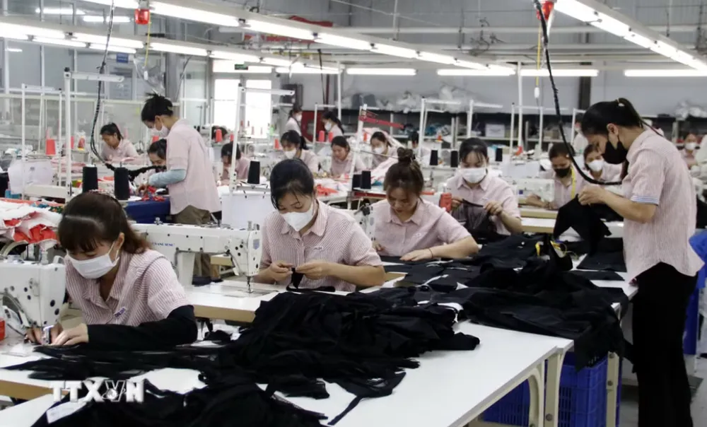 Dây chuyền sản xuất hàng xuất khẩu ở Bắc Ninh. Ảnh: TTXVN