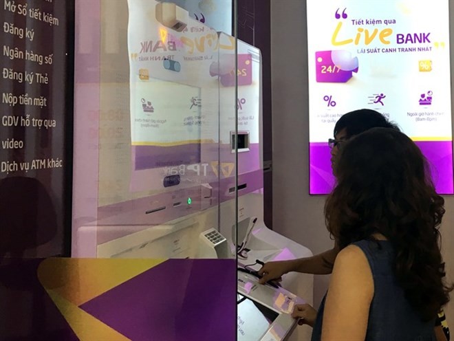 Vietnam has significant room to promote inclusive finance, given 70 percent of its population is living in rural areas and many are locked out of the conventional banking system due to low income (Photo: VNA)