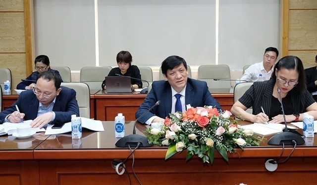 Health minister talks with China,India,Russia ambassadors on COVID-19 vaccines ảnh 1