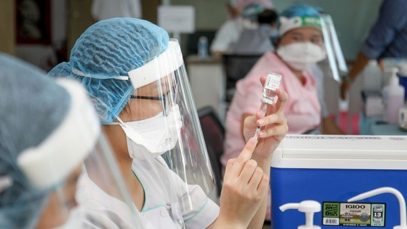 HCMC announced 473 residential areas under lockdown as infections surge ảnh 1