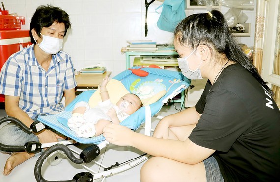HCMC takes care of children orphaned after parents both die of Covid-19 ảnh 1