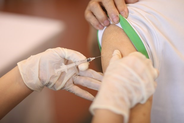 Covid-19 vaccination now covers children aged 12 - 17: MoH ảnh 1