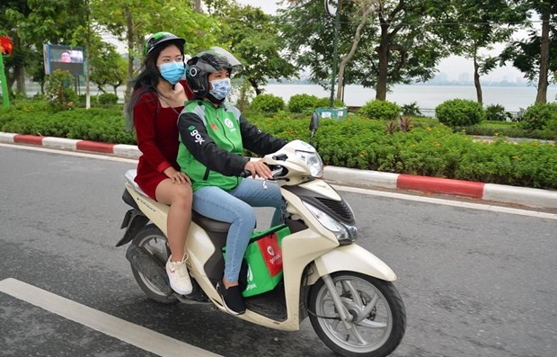 Motorbike taxi services returns in Hanoi ảnh 1