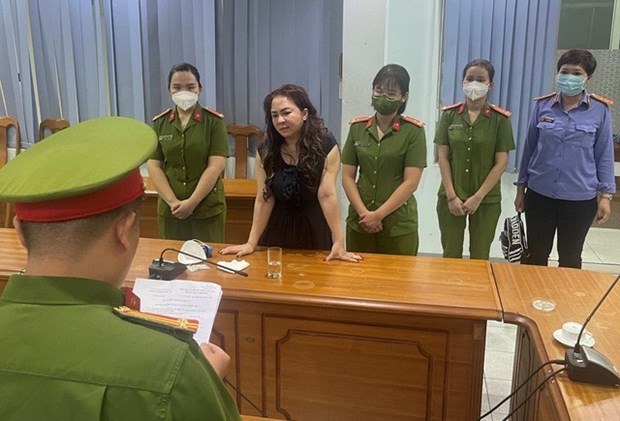 Nguyen Phuong Hang listens to a police officer reading the investigation and detention decisions in March 2022. (Source: baochinhphu.vn) Nguyen Phuong Hang listens to a police officer reading the investigation and detention decisions in March 2022. (Source: baochinhphu.vn)