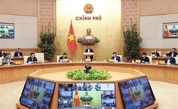 Prime Minister Pham Minh Chinh speaks at the meeting. (Photo: VNA)
