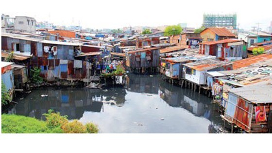 Slums on rivers in HCMC