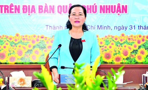 Chairwoman of the People's Council of Ho Chi Minh City Nguyen Thi Le speaks at the working session