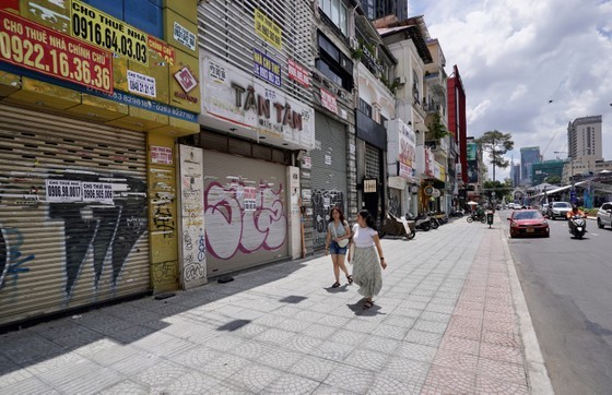 Many houses in front of Le Loi Street in Ho Chi Minh City's District 1 - the city's downtown area - are left empty without tenants