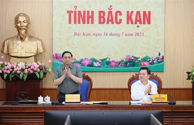 During the working session. (Photo: VNA)